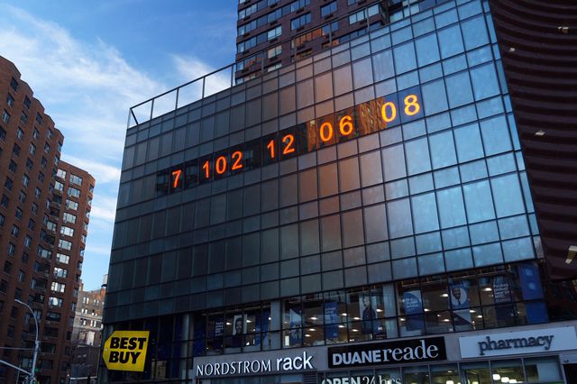 A photograph of the Climate Clock on display in Union Square.